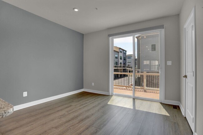 Building Photo - Luxury 4-Story Townhome with Rooftop Terrace!