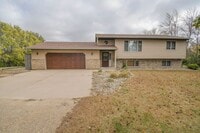 Building Photo - Spacious 4-Bedroom Acreage with Stunning Views Near Hartford — 1.5 Acres of Country Living!