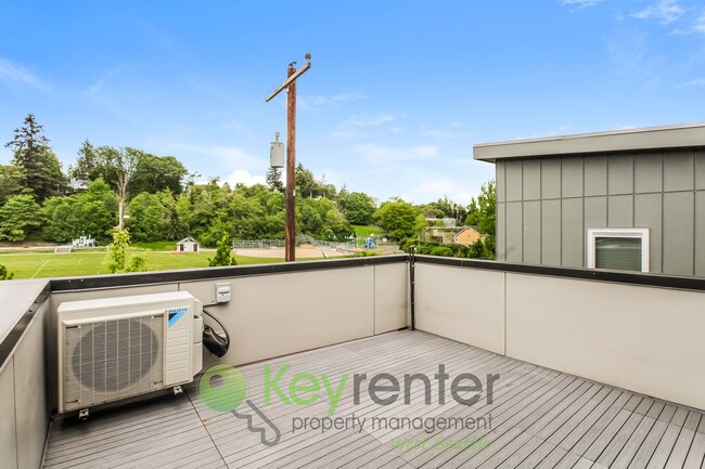 Building Photo - Modern 3 Bedroom with Rooftop Deck and In Unit Laundry