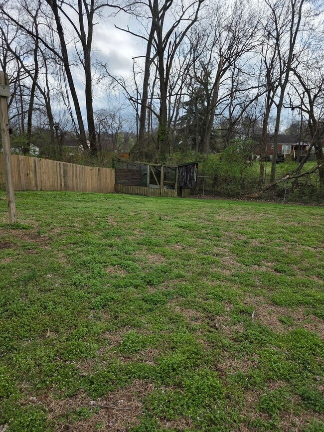 Building Photo - Charming 2BR with Walk-Out Basement, Fenced Yard & Flexible Murphy-Bed Office