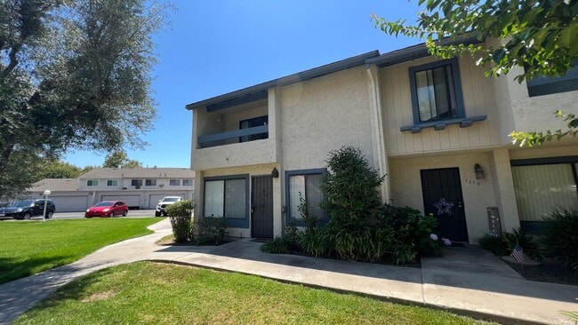 Primary Photo - Charming 4 Bed 3 Bath Brea Townhome with P...