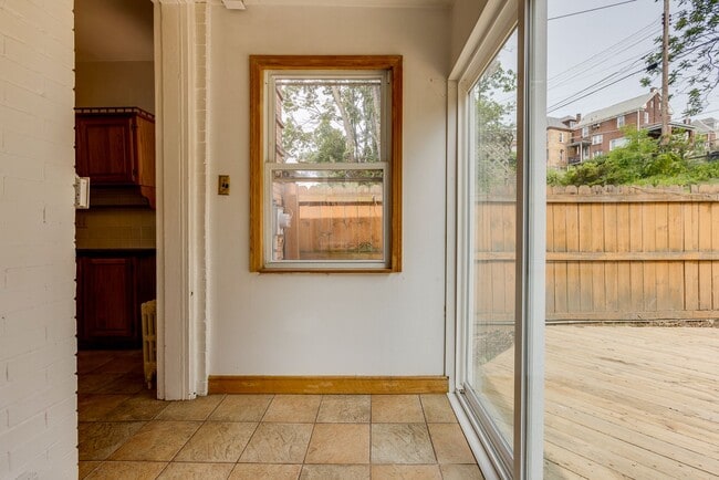 Building Photo - AVAILABLE June 2026 - Beautiful 4 Bedroom, 2 Bath Home w/ Front Porch Swing!