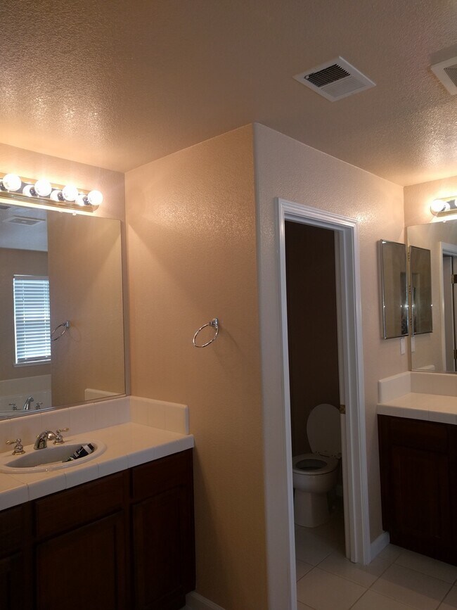 Building Photo - Gated Community Stunner ready to be called...