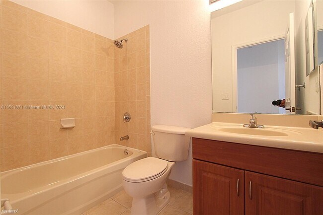 Building Photo - 3 br, 2.5 bath House - 11202 NW 83rd St Ap...