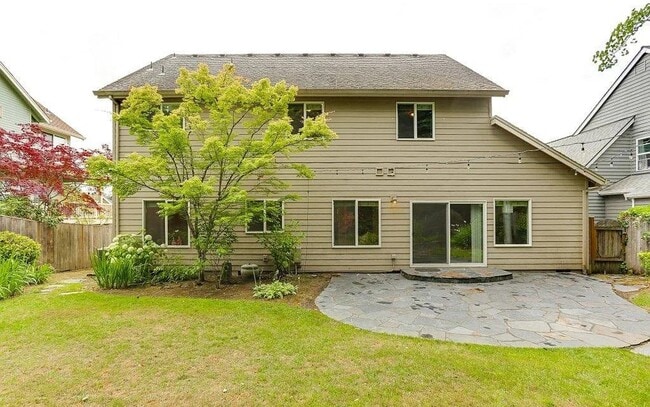 Building Photo - Spacious Four-Bedroom Home with Gourmet Kitchen, Multiple Living Areas, Loft, and Beautifully Lan...