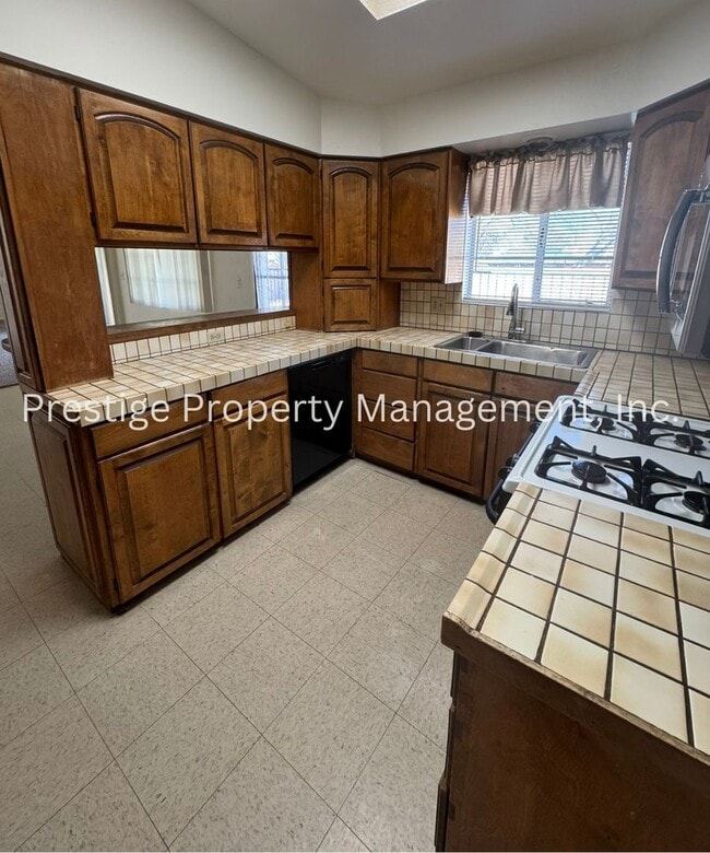 Building Photo - Stop Your Search! This 3/2+ Bonus Room is Centrally Located with a Pool and More!