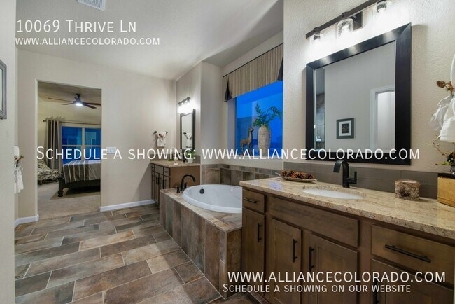 Building Photo - 10069 Thrive Ln