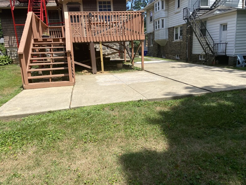 Common cement rear area - 7936 Montgomery Ave