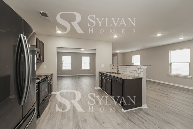 Building Photo - Come view this charming home