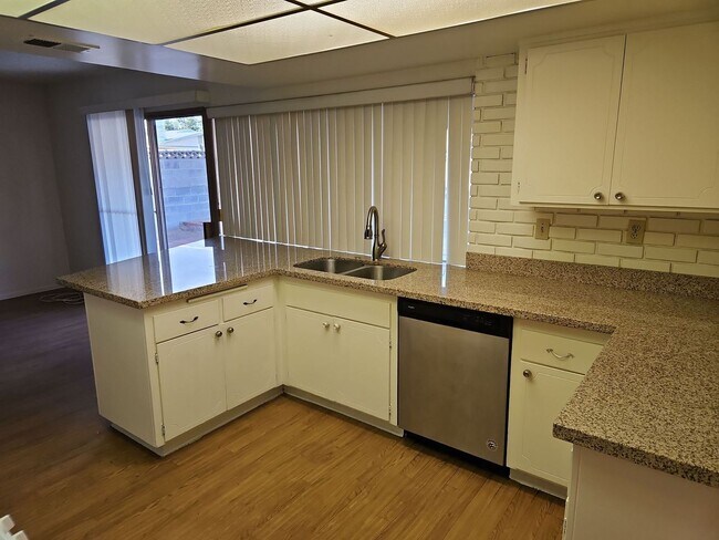 Building Photo - Spacious 4-Bedroom Home with Large Backyard & Covered Patio!