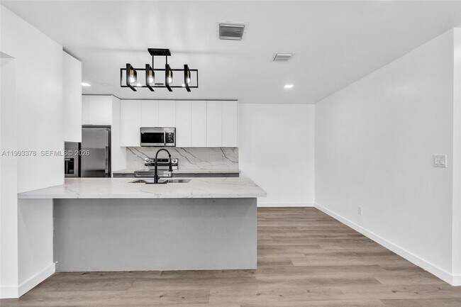 Building Photo - 7041 Raleigh St