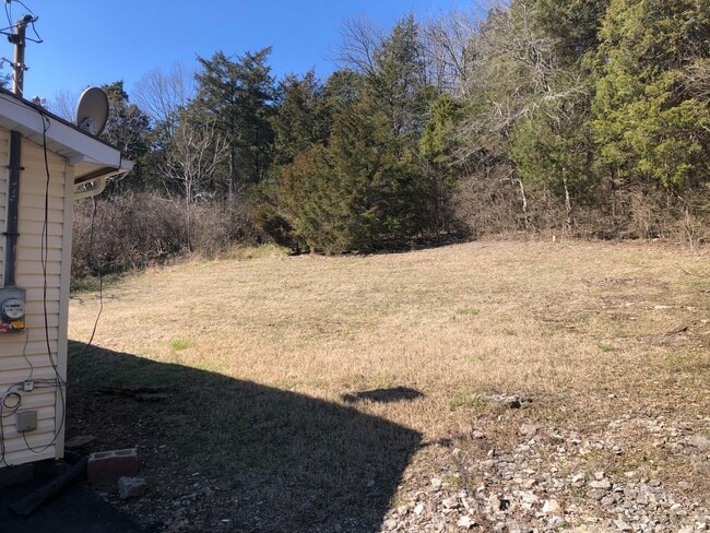 Building Photo - 3 Bedroom cottage overlooking green space ...