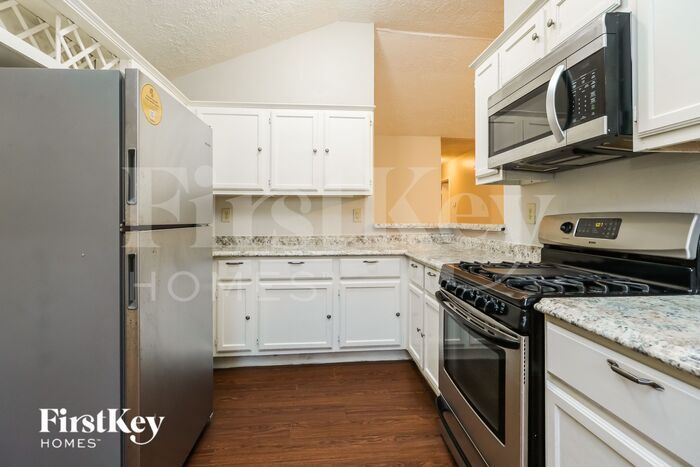 Building Photo - 6027 Woodmancote Dr