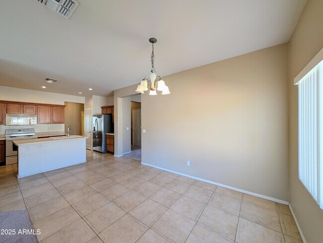 Building Photo - 16071 W Gelding Dr