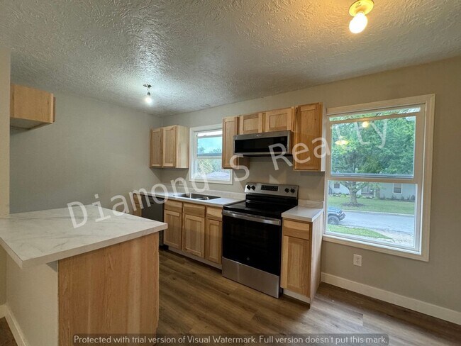 Building Photo - 5649 S Ferguson Ave