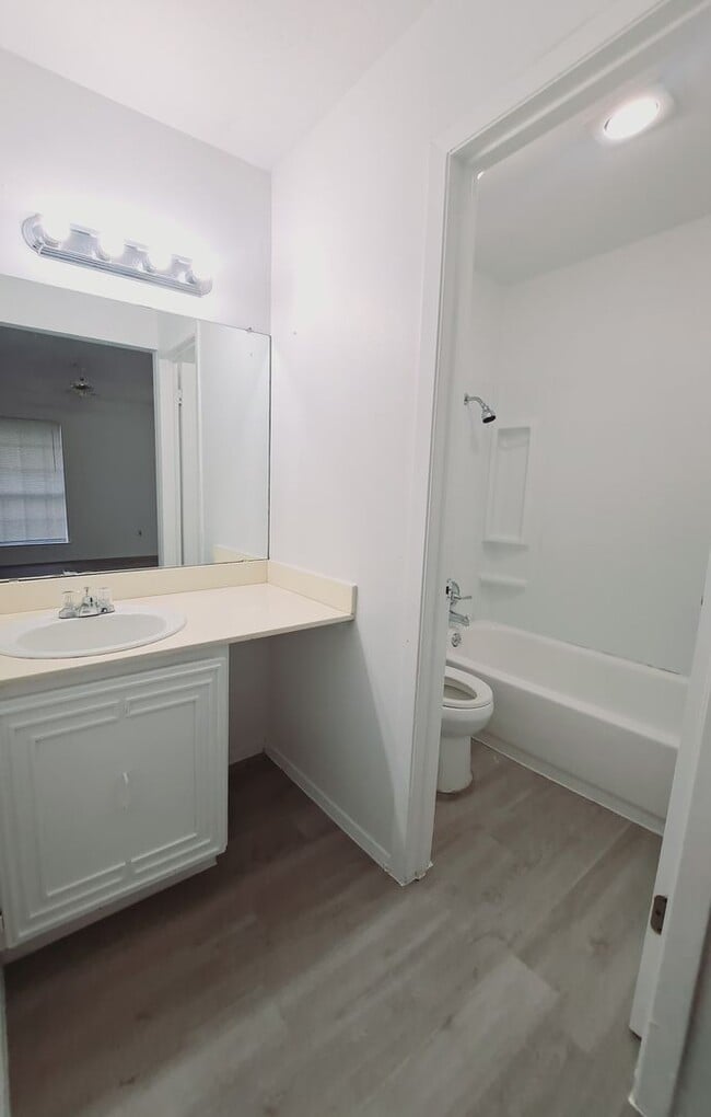 Building Photo - Amazing 3/2 with Garage Conversion Ready For Move In