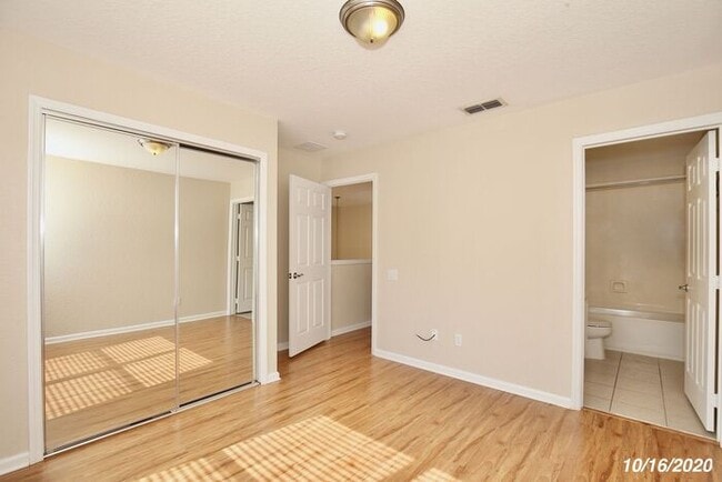 Building Photo - Beautiful 3/3.5 Townhome with a Spacious 2 Car Garage in the Gate Guarded Community of Spring Isl...