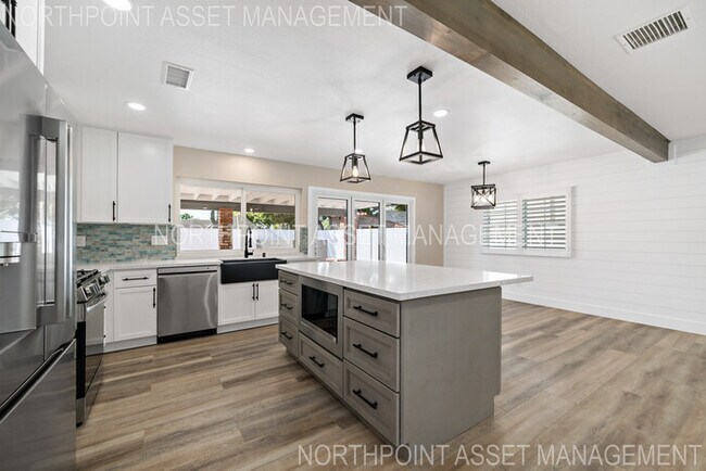 Building Photo - Brand New Remodel – Stunning Pool Home wit...