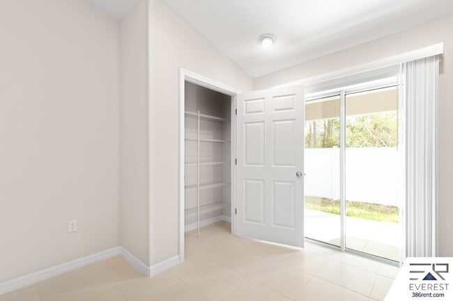 Building Photo - FULLY FENCED, LIKE- NEW 3/2/1 TOWNHOUSE ON A CUL DE SAC IN BEAUTIFUL SEMINOLE WOODS