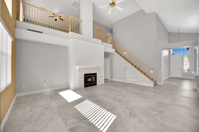 Building Photo - Spacious 4-bedroom, 3-car garage home feat...