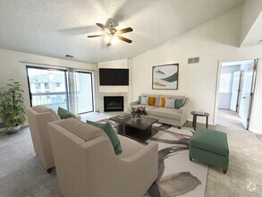 Living Room with Ceiling Fan and Fireplace - Huntington Glen