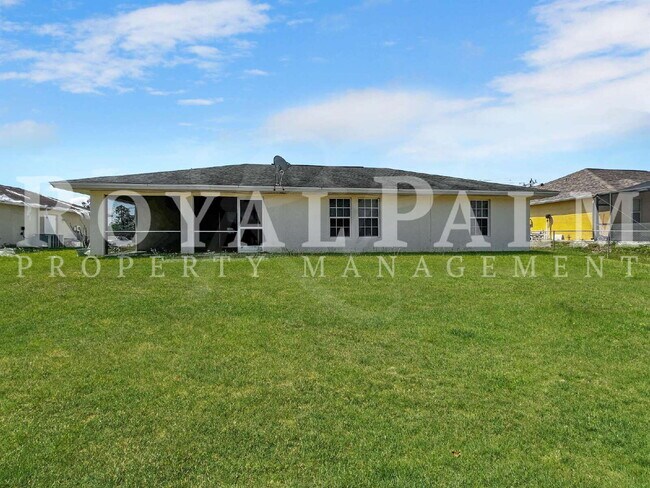 Building Photo - New Year, New House? 3BR/2BA Lehigh Acres Home with Garage, Lawn Care, and Big Main Character Energy