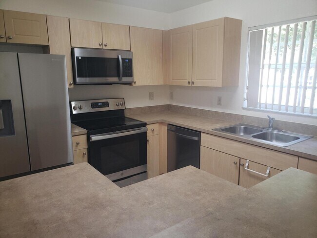 Building Photo - 8587 SW 23rd Ct