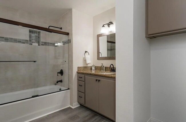 Building Photo - This condo has it all: location, style, an...