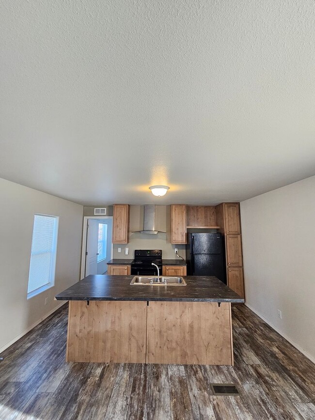 Building Photo - Updated Three Bedroom Home