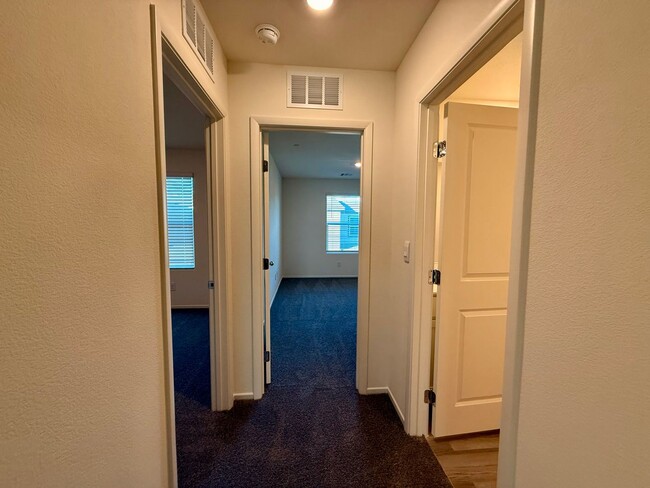 Building Photo - Brand-New Townhome for Rent in the Highly ...