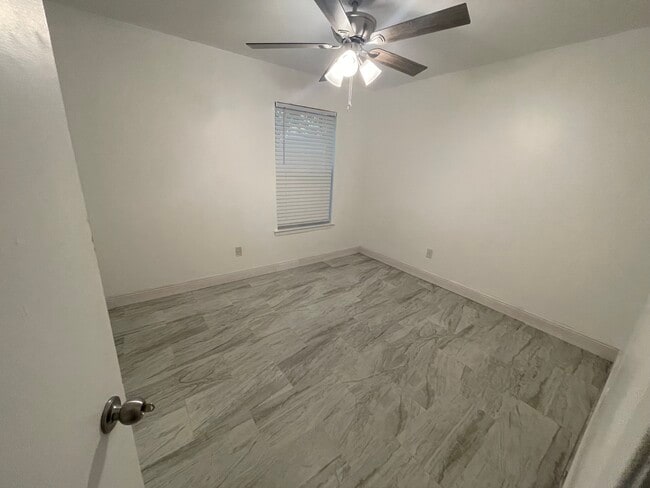 Building Photo - 6831 Tiki Ln