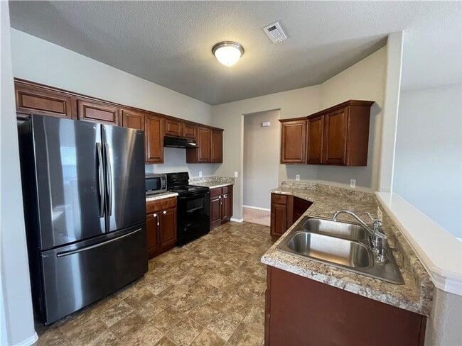 Building Photo - Spacious 3-Bedroom Springdale Home with Fenced Yard