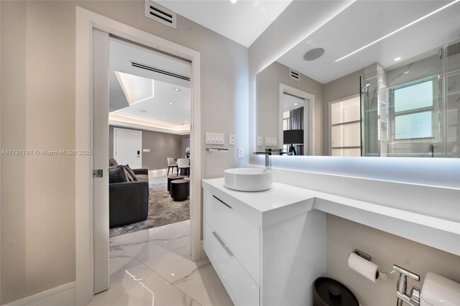 Building Photo - 10190 Collins Ave