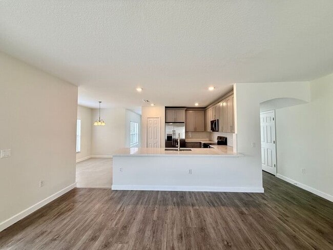 Building Photo - GORGEOUS, Large Completely Renovated Two-Story 4/2.5 PLUS LOFT in POINCIANA VILLAGES!