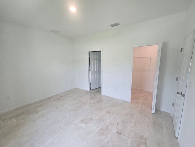 Building Photo - Brand New 3 BEDROOM 2 BATH AND ONE CAR GAR...