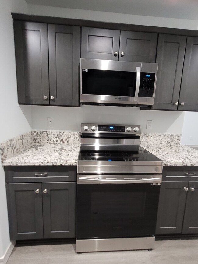 Building Photo - Brand New Construction Duplex