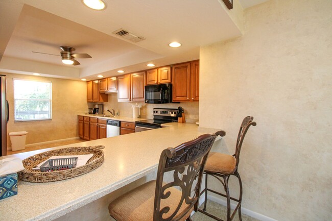 Building Photo - ** 2/2 CHARMING FURNISHED CONDO AT THE ISL...