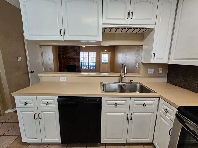 Building Photo - Stunning two-level, two-bedroom, one-and-a-half-bathroom townhome