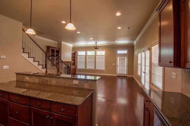 Building Photo - Luxurious Executive Row House in Northeast Fayetteville! Lawn care included!