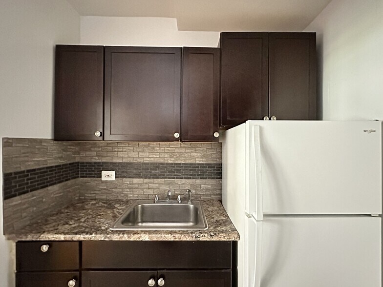 Building Photo - 1369 W Estes Ave