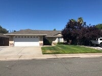 Building Photo - 4 BED 2 BATH LOCATED IN THE RAVENWOOD SUBDIVISION