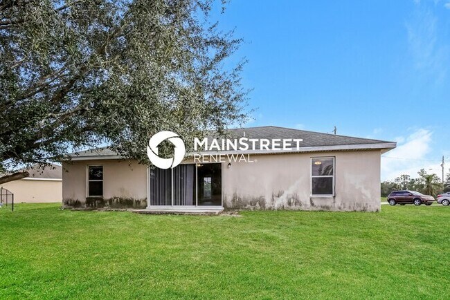 Building Photo - 3 Bedroom Pet-Friendly Home in LEHIGH ACRES, FL with Main Street Renewal