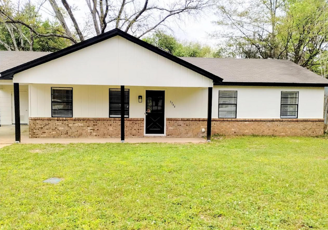 Building Photo - 5746 Magnolia Dr