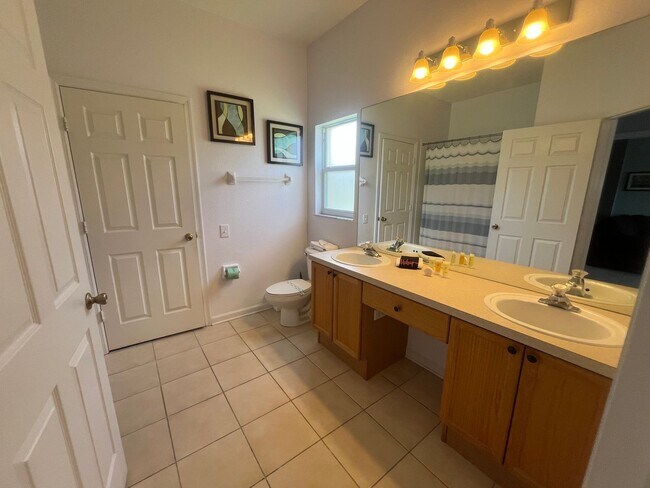 Building Photo - Now Leasing! Stunning 4BR Home in Gated Co...