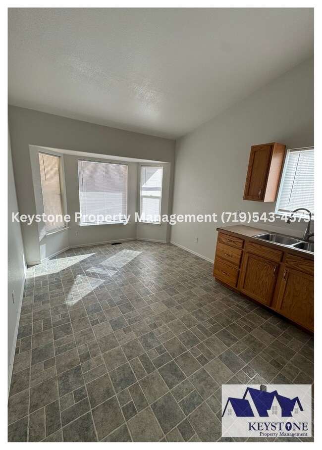 Building Photo - Spacious Pueblo West Duplex 3 Bed/3 Bathroom Unit with 2 Car Garage  $1995/$1995