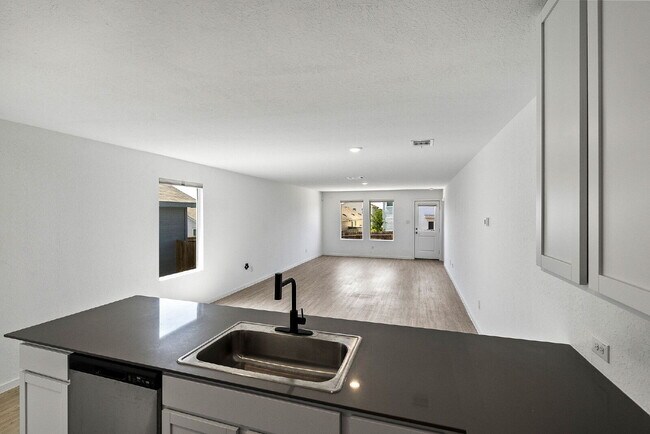 Building Photo - Stylish One Story Retreat with Open Living and Backyard Deck Escape