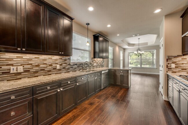 Building Photo - AVAILABLE NOW 4 BEDROOM 2.5 BATH HOME IN A...