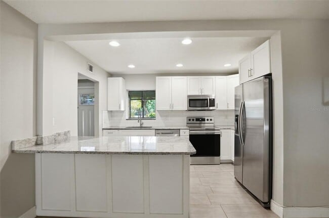 Building Photo - 727 N Himes Ave