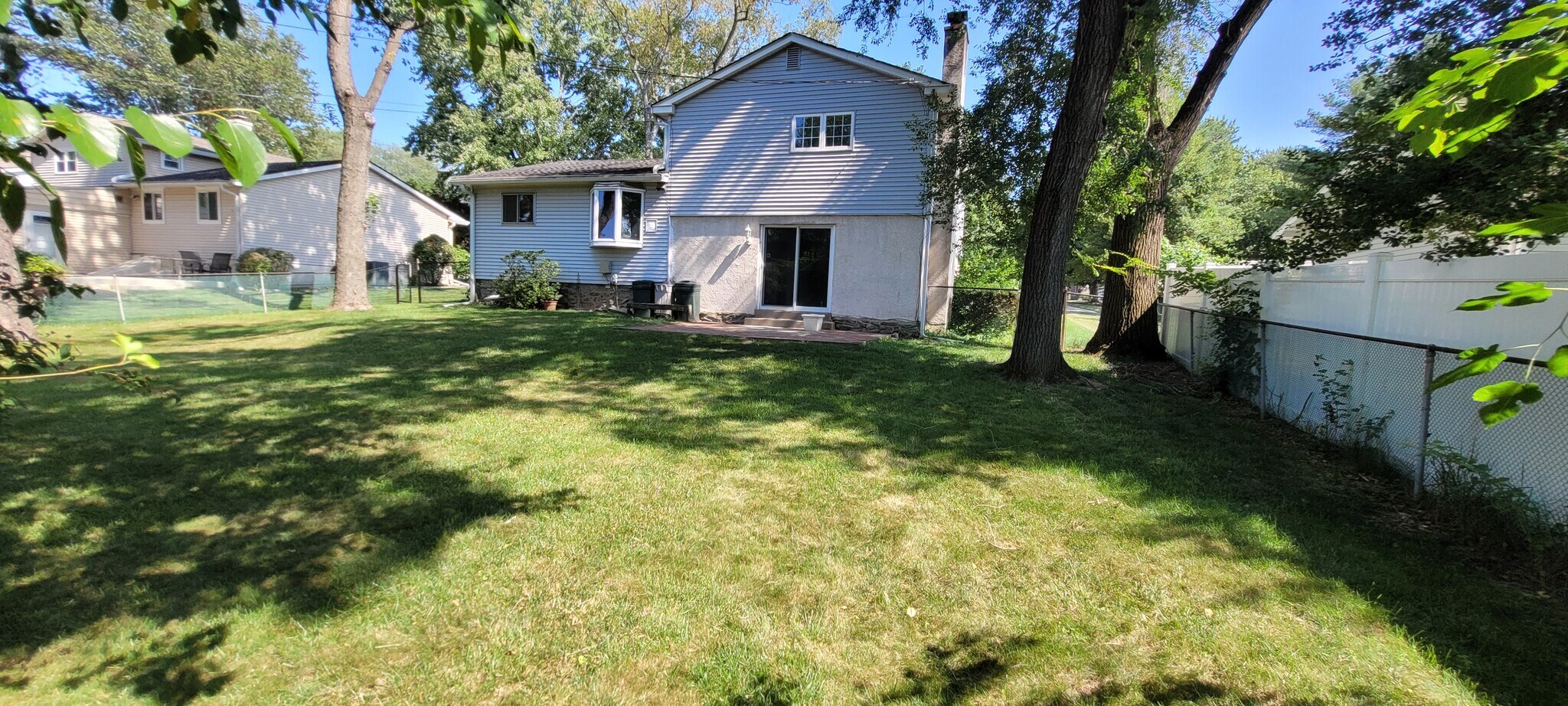 Back of yard viewing home - 270 Riverview Rd