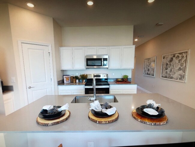 Kitchen, photo from model house - 656 Tanaro Ln